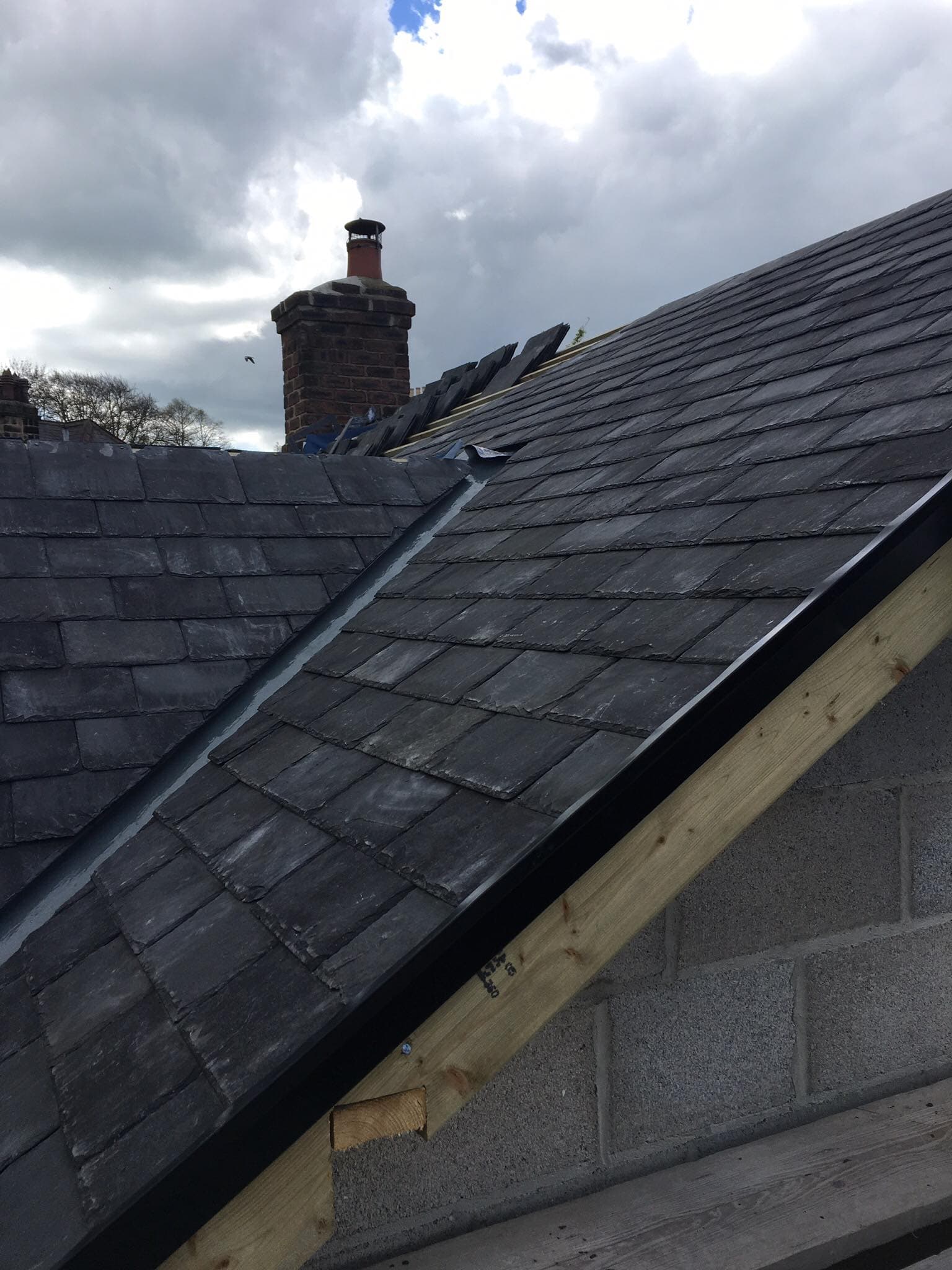 A slate roof by APM Roofing